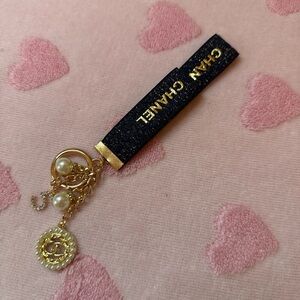 CHANELbeaute’ Black & Gold Logo Pearl Charm Keychain